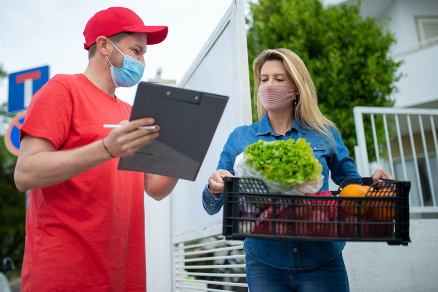 Customer receiving grocery delivery