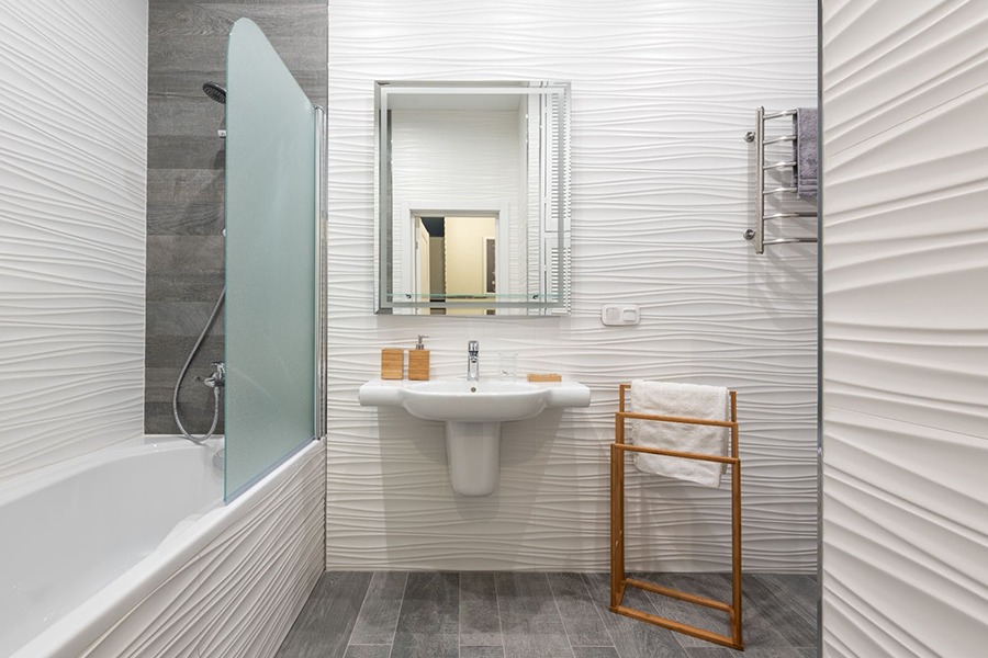 Modern bathroom interior with bath and washbasin