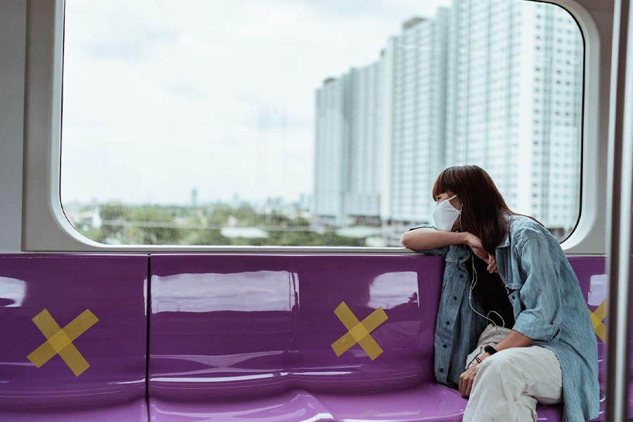 Individual sitting on public transport