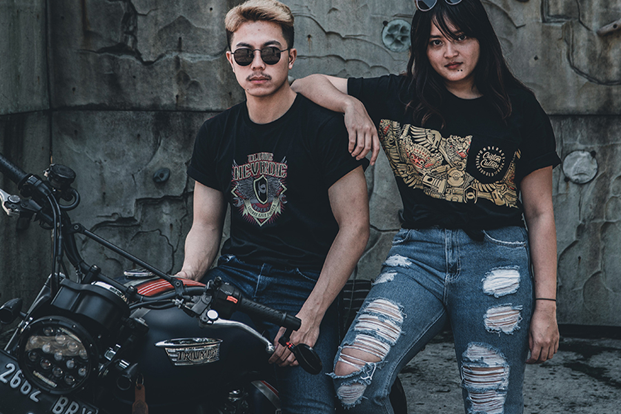 Biker couple rocking ripped biker blue jeans bottoms