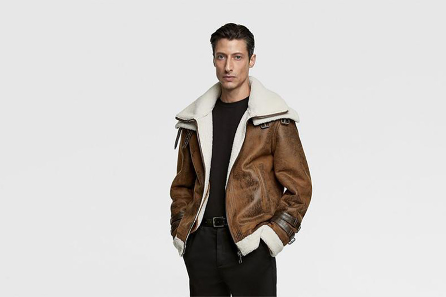 A man rocking a brown shearling coat