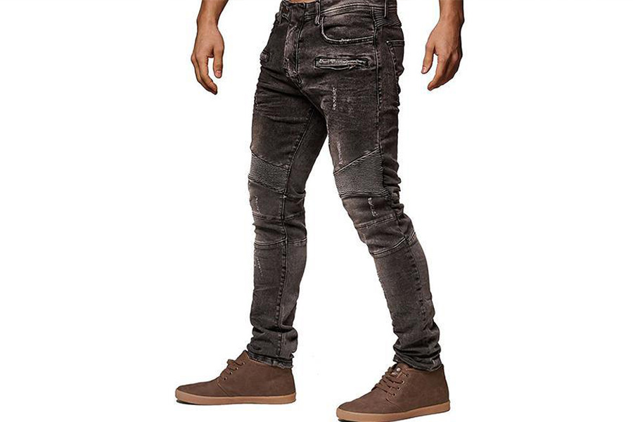 A man rocking slim-fit punk trucker trousers