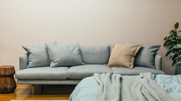 Cozy Sofa And Bed in A Contemporary Bedroom