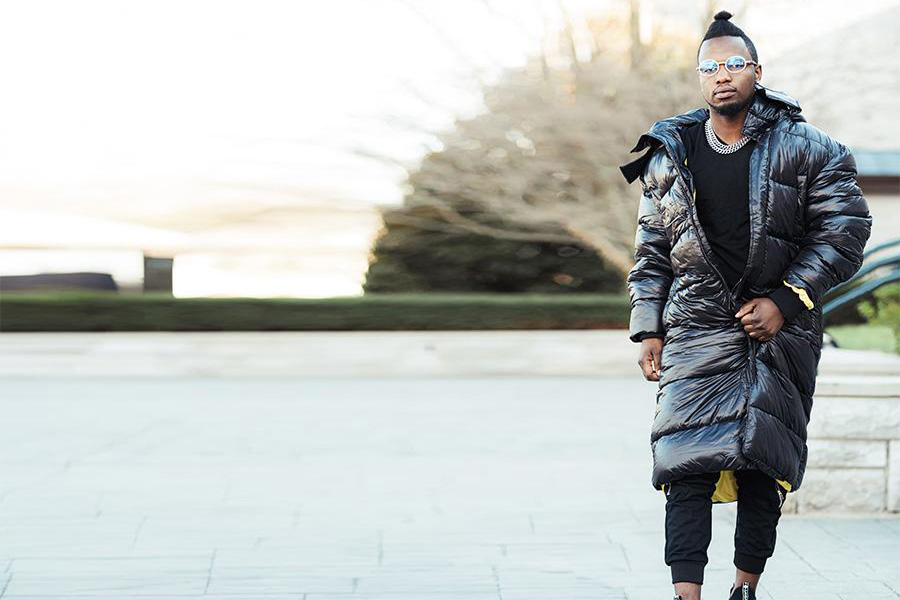 Man rocking a black puffer jacket outdoors