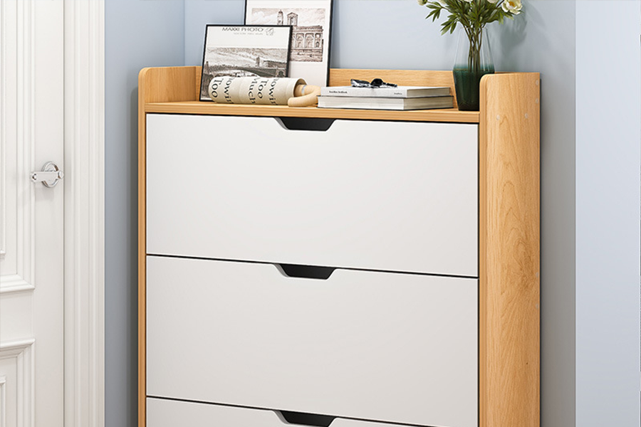 Wooden multi-layer shoe cabinet against a wall