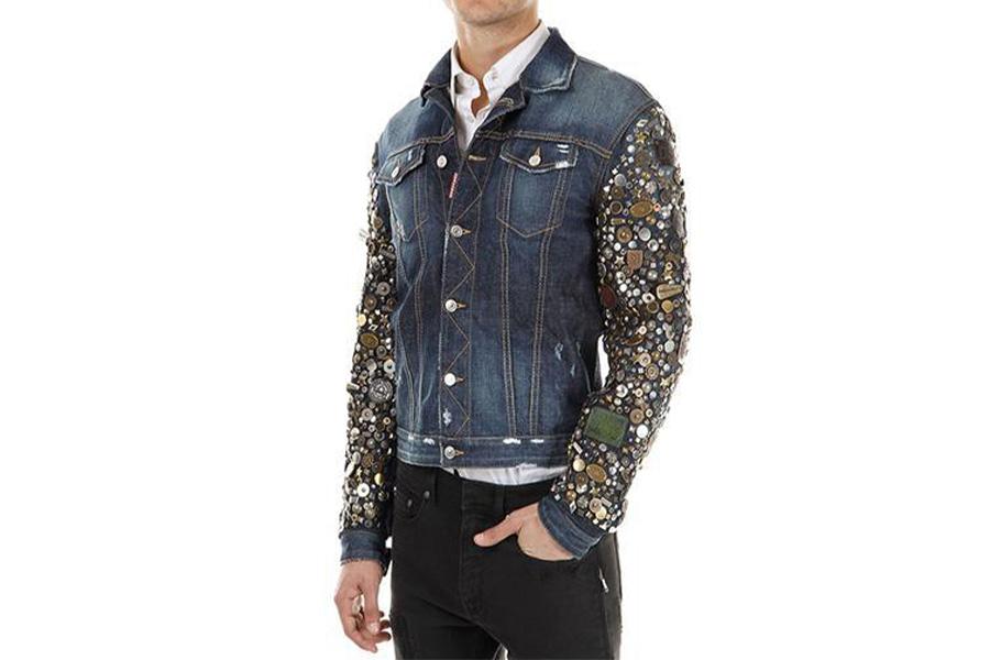 A man in studded denim jacket