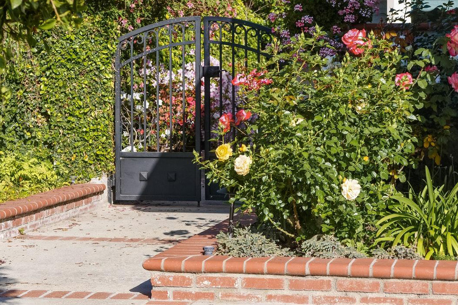 Garden gate nestled in plants