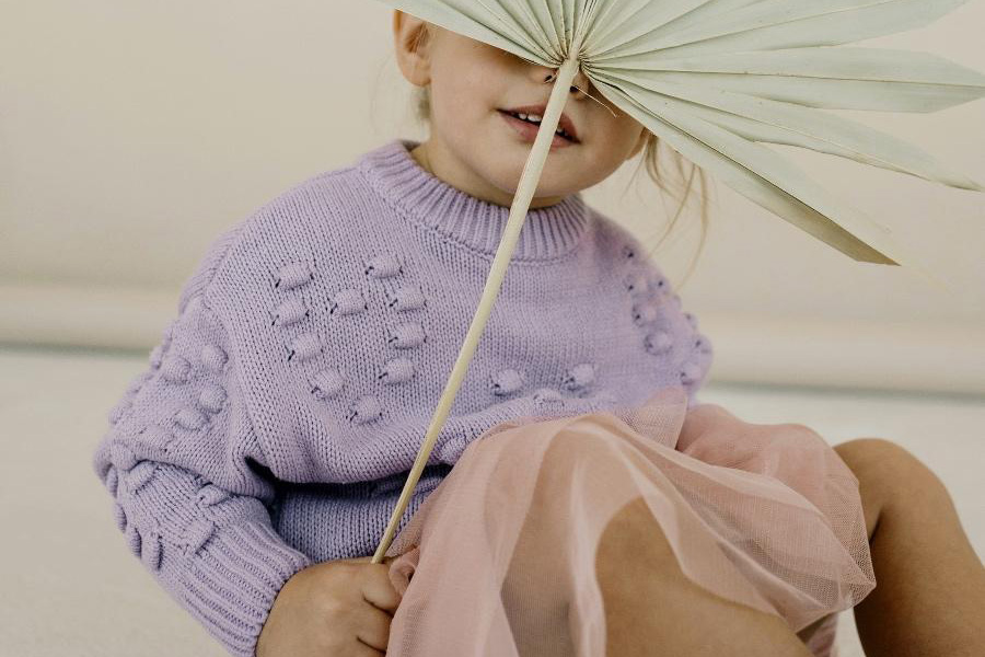 Girl wearing a knitted vest