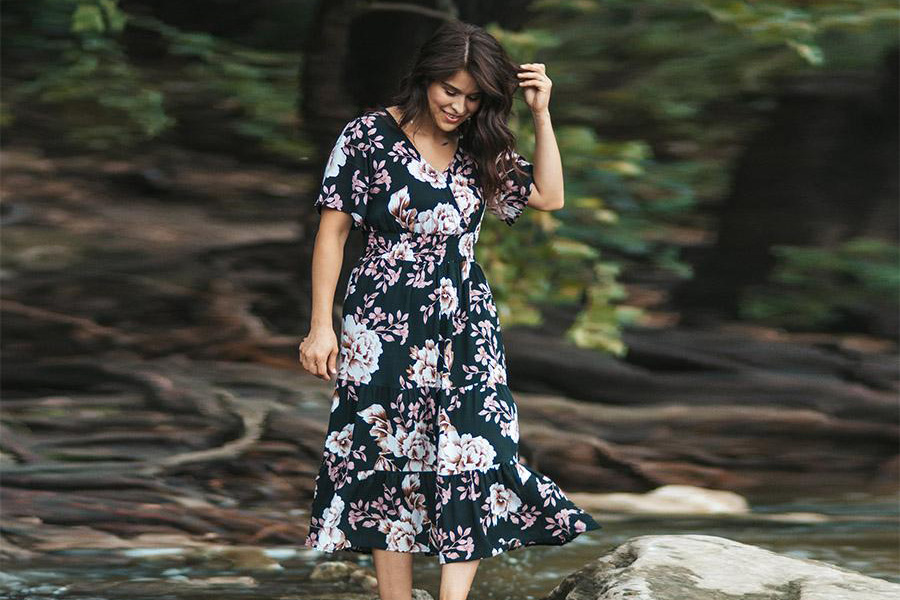 Lady rocking a floral dress for the fall/winter