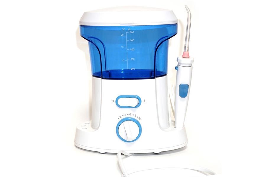 A corded dental irrigator 