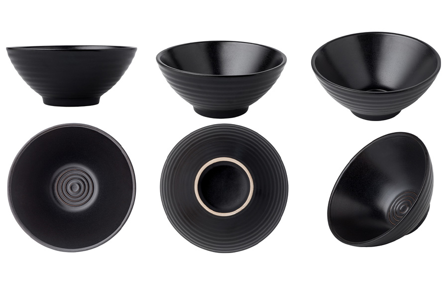 A set of ceramic bowls on white background