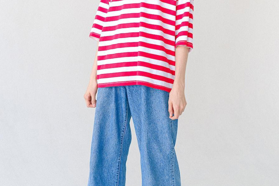 Anonymous boy posing with short-sleeved shirt