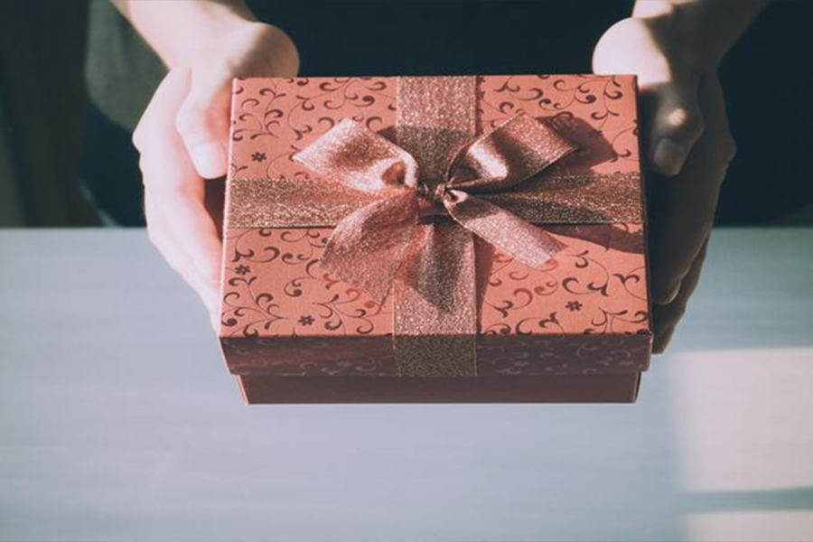 A beautiful red gift box with neat packing