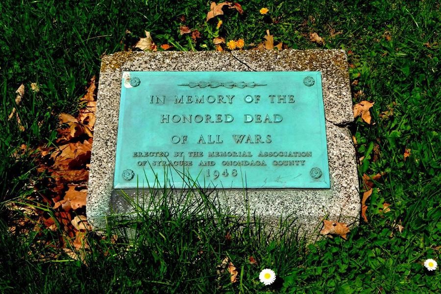 Bevel headstone slightly above the ground