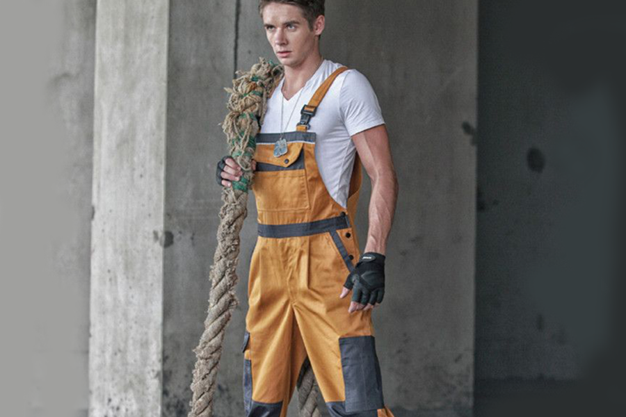 Man posing with fishing trouser bibs