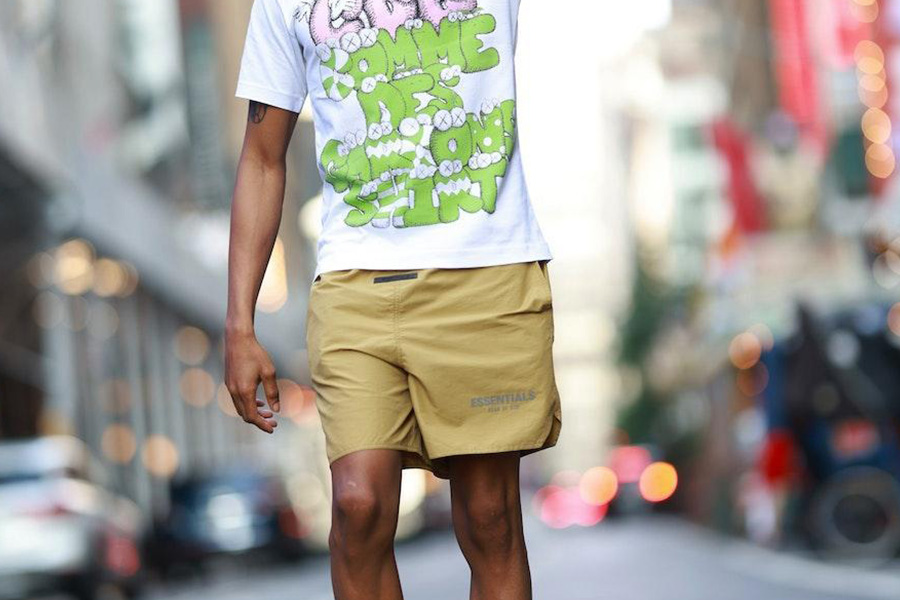 Teenager wearing a short-sleeved tee with psychedelic prints