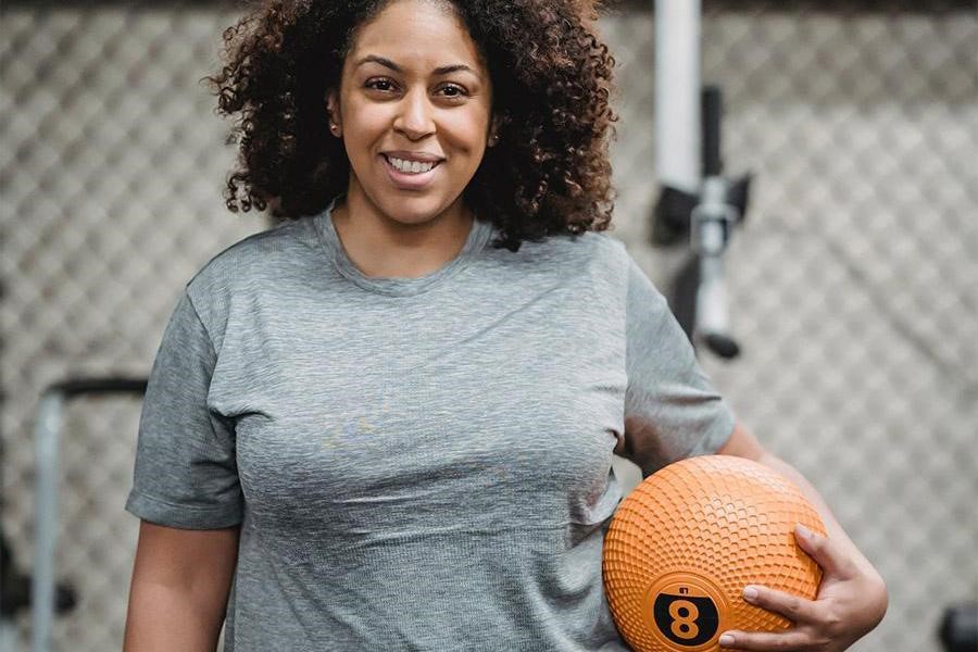 Woman wearing a gray-colored classic T-shirt