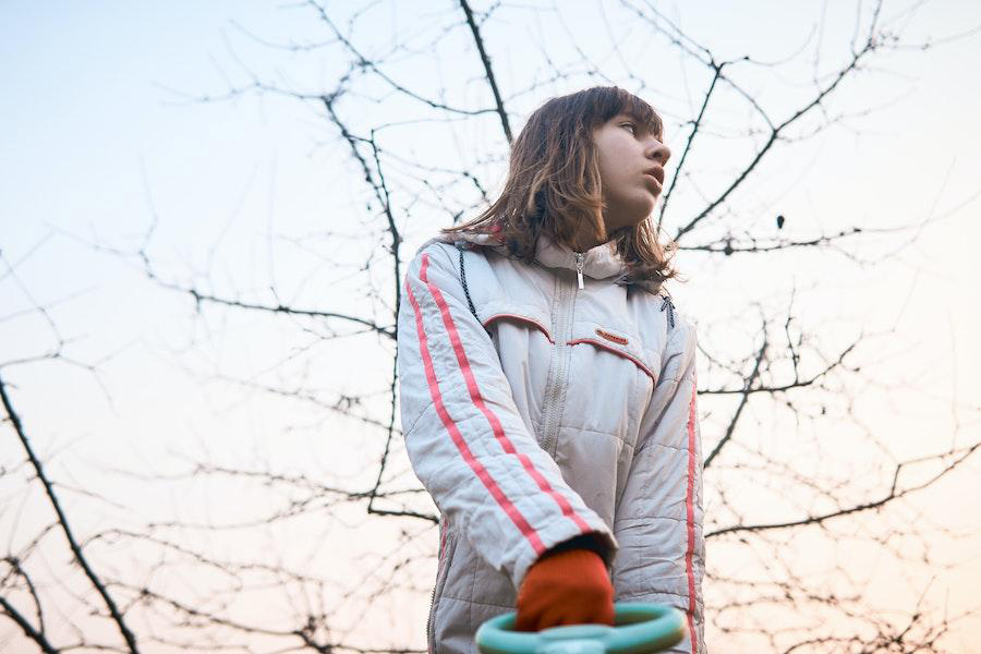 Woman wearing a white modular puffer jacket