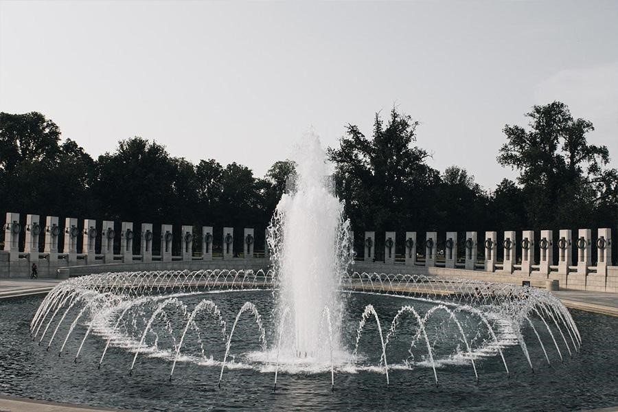 An outdoor fountain with a surface pump