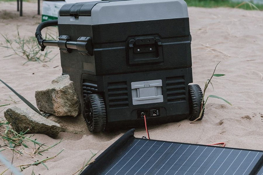 Portable car fridge with the solar panel