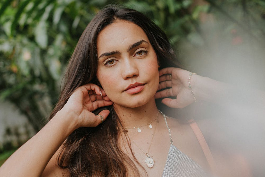 A beautiful woman in an elegant camisole dress