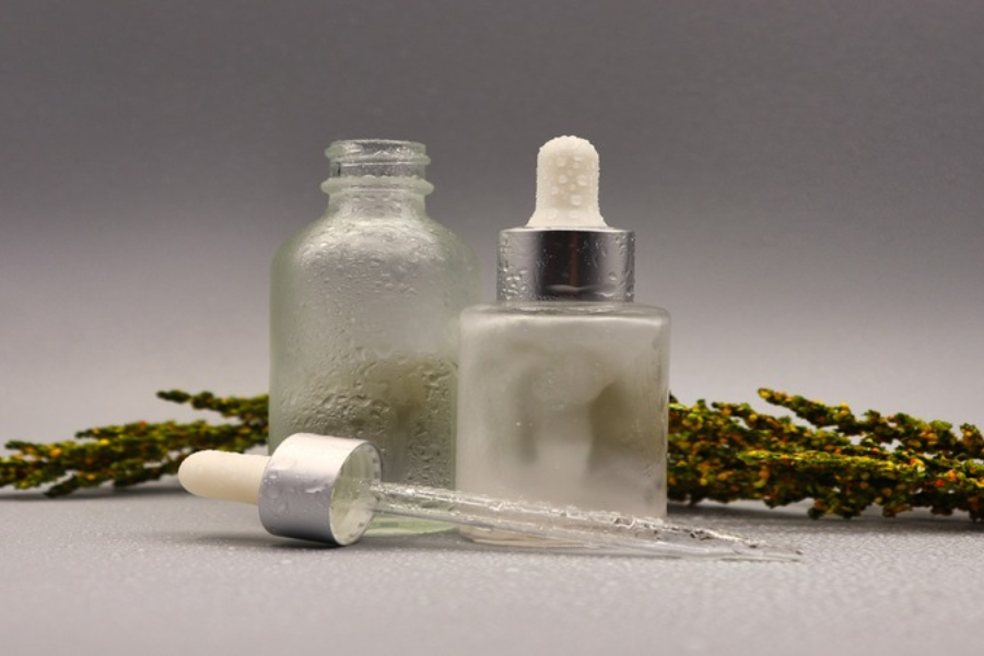 a transparent dropper bottle