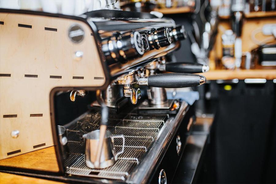 Advanced coffee making machine during operation