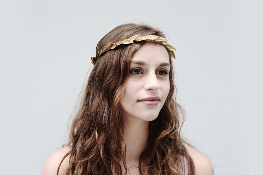 Beautiful women rocking a golden laurel headband