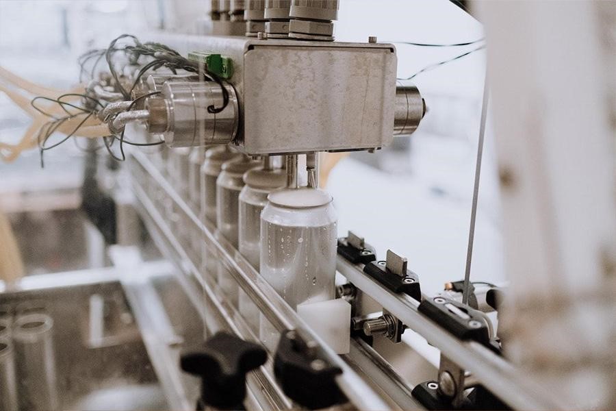 Machine Filling Beer in Aluminum Cans