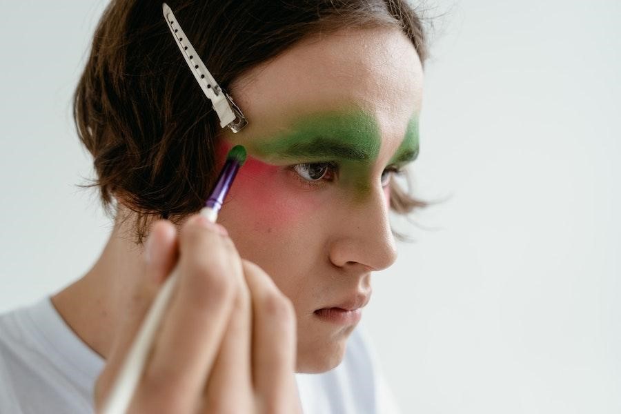 Make up artist wearing a silver crocodile clip