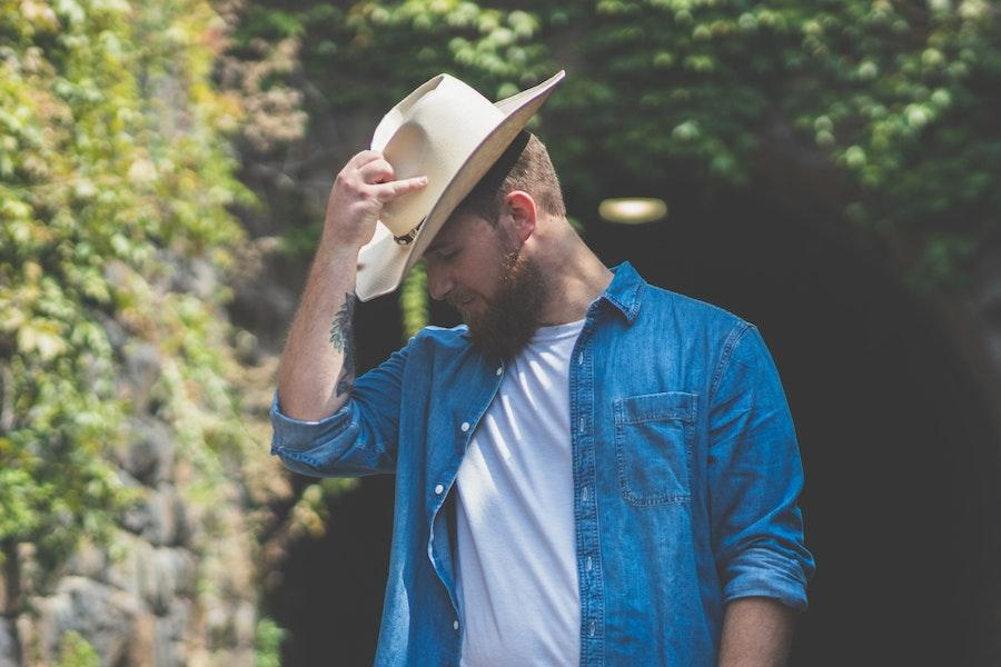 Man striking a western pose in a Bangora cowboy hat