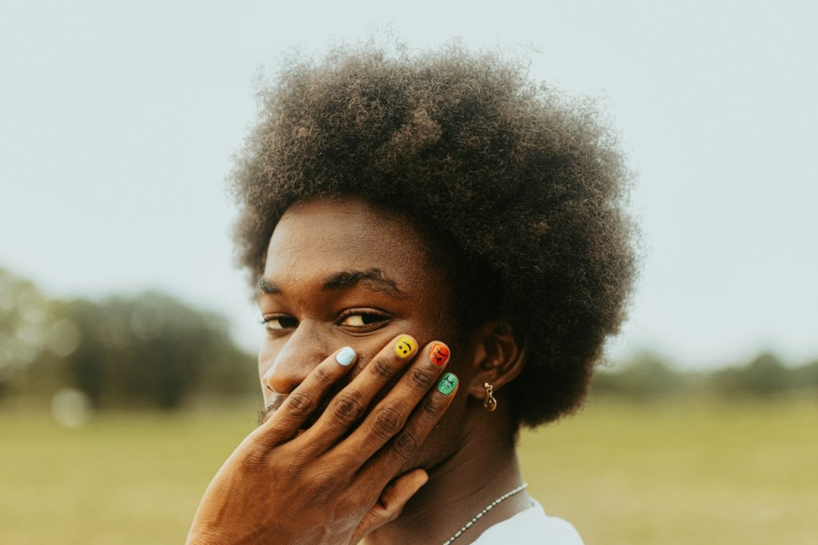 man with painted nail art