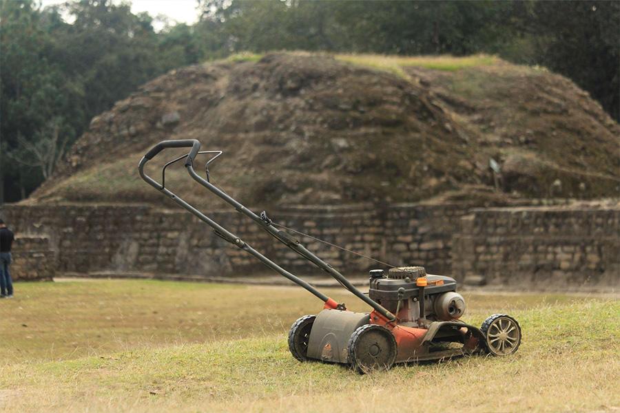 Mower parked on a an open field