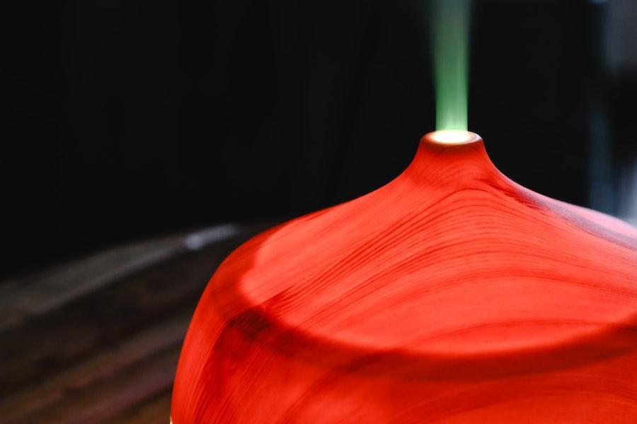 Night light humidifier releasing vapor into the atmosphere