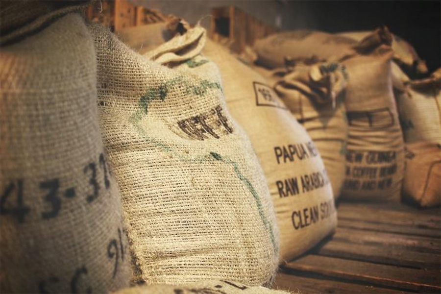 Tan burlap sacks for coffee beans