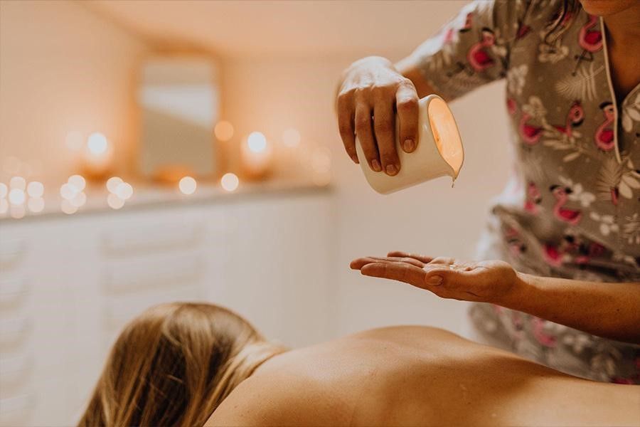 Woman getting a massage with oils