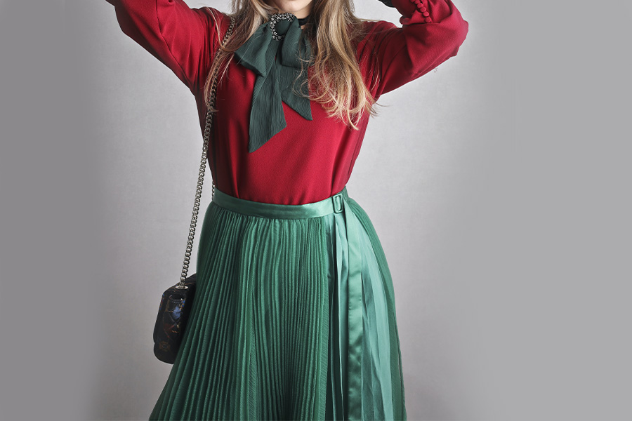 woman wearing a green adjustable skirt