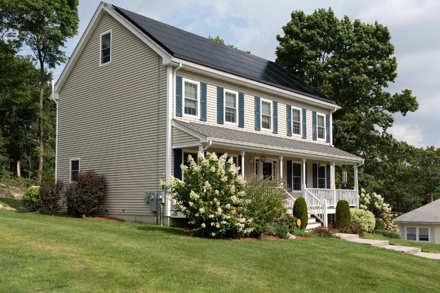 All-black solar panels on the rooftop of a house