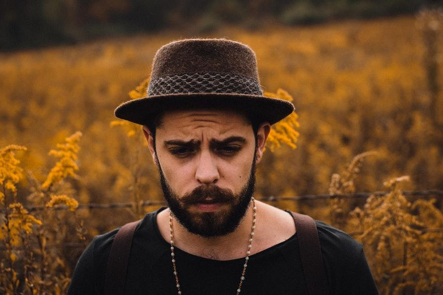 Man rocking a brown felt hat