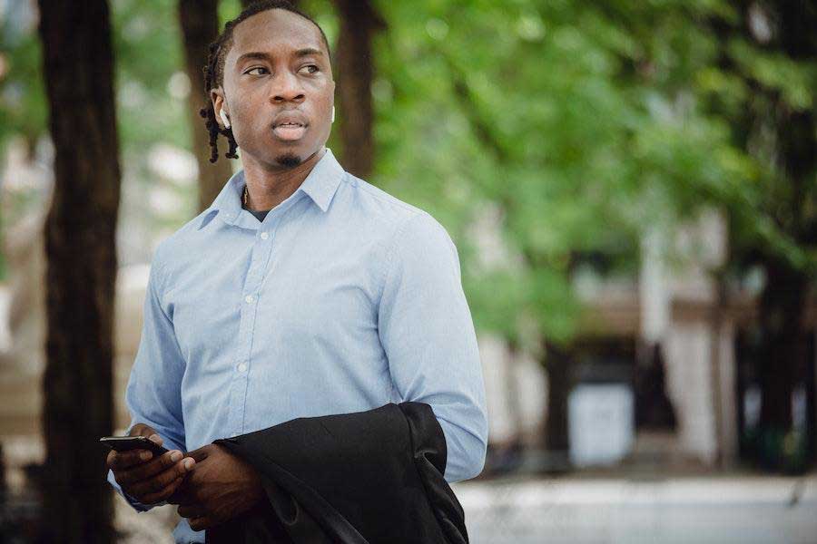 Man wearing a classic blue button-up shirt