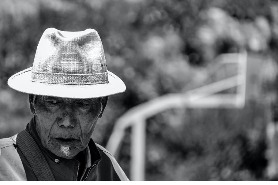 man wearing a white felt cowboy hat