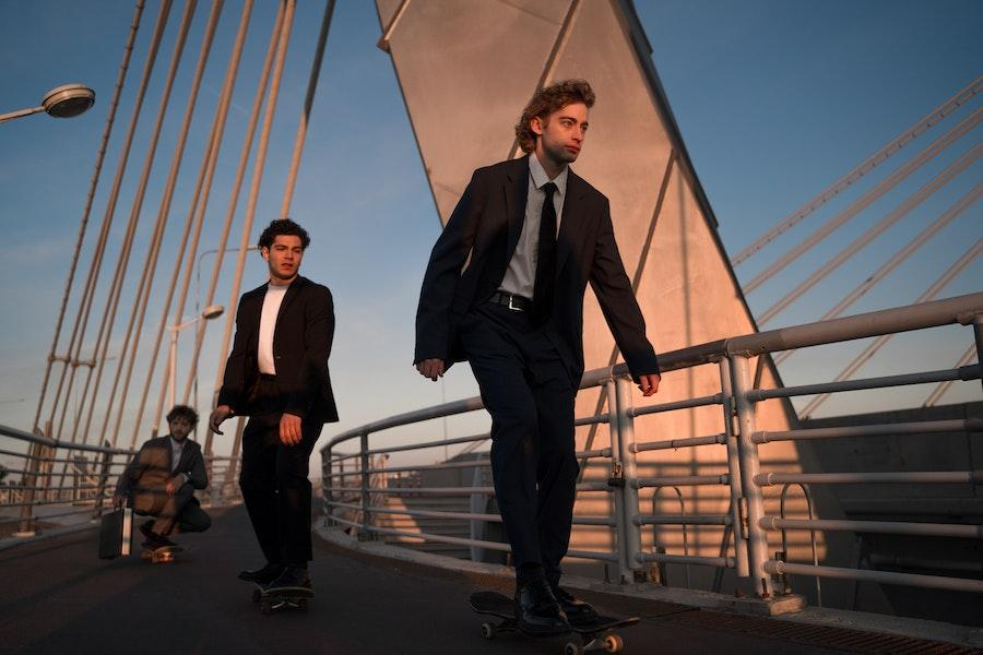 Men walking in classy black tailoring