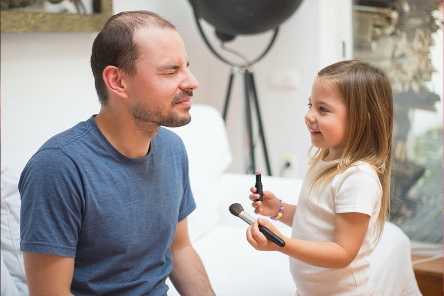 Parent and child with beauty products