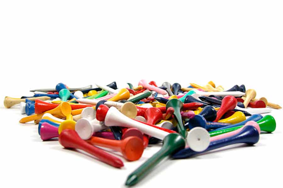 Pile of colorful golf tees made of bamboo material