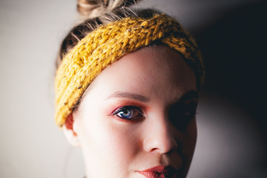 Simple wide headband frames round face and creates defined silhouette