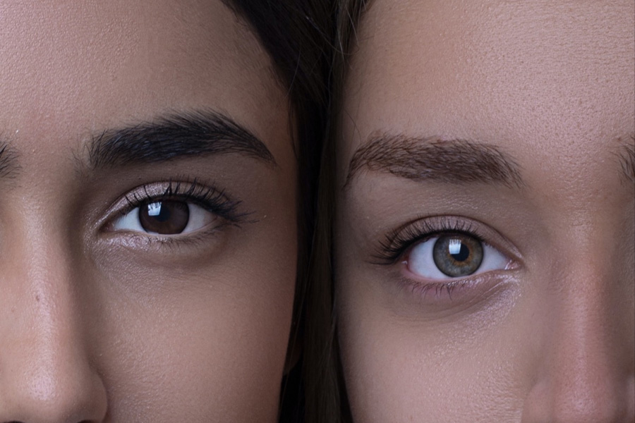 Two women wearing natural-looking makeup