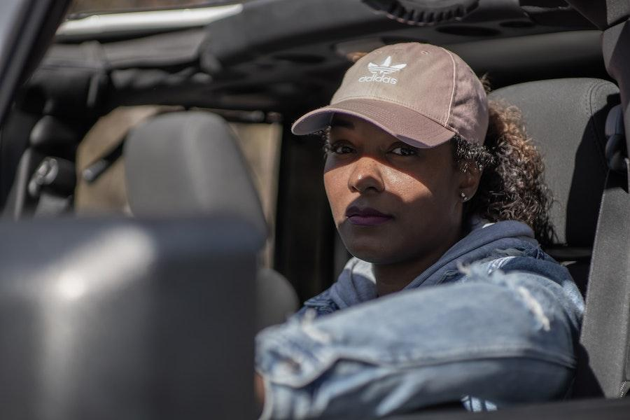 Woman rocking a pink denim baseball hat