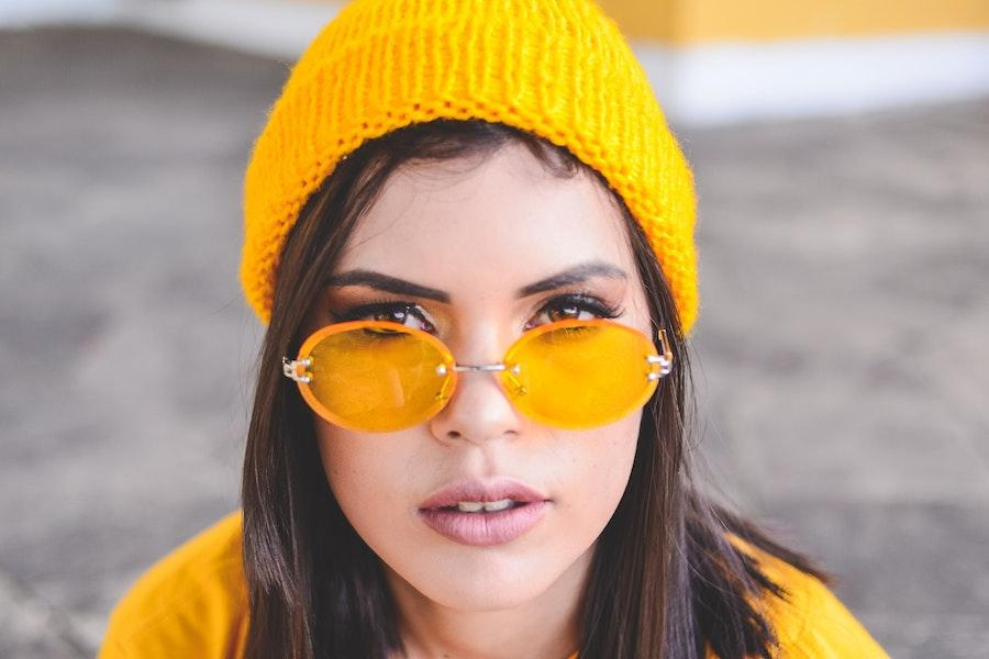 Woman rocking a yellow skull beanie